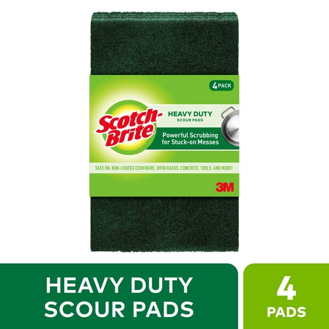 Scotch-Brite® Heavy Duty Scour Pad 4-pack featuring dark green abrasive pads in green packaging, designed for powerful scrubbing of stuck-on messes on non-coated cookware, oven racks, concrete, and tools, suitable for heavy-duty kitchen and outdoor cleaning.