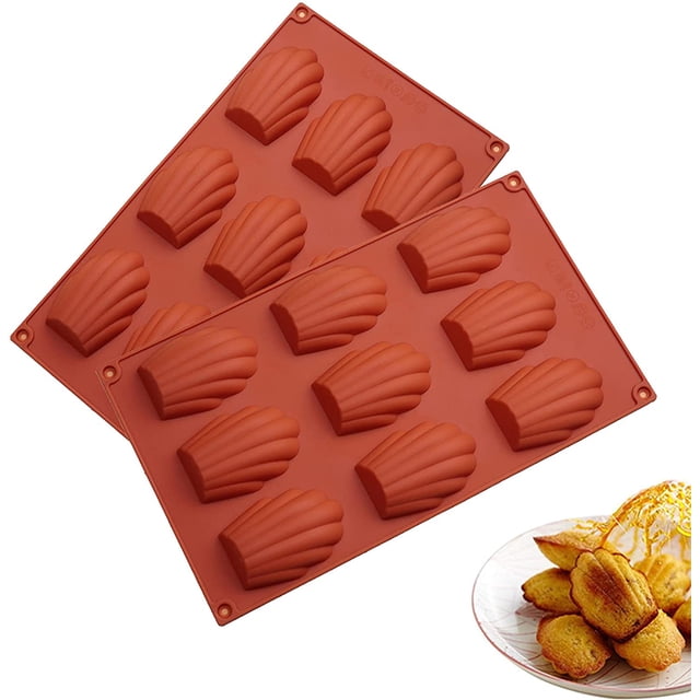 9 Cavity Madeleine Pan, 2Pcs Nonstick Silicone Madeleine Molds in brick red color, featuring a shell-shaped design for baking cakes or madeleines. Perfect for bakeware enthusiasts, these pans include nine cavities each for uniform baking results.
