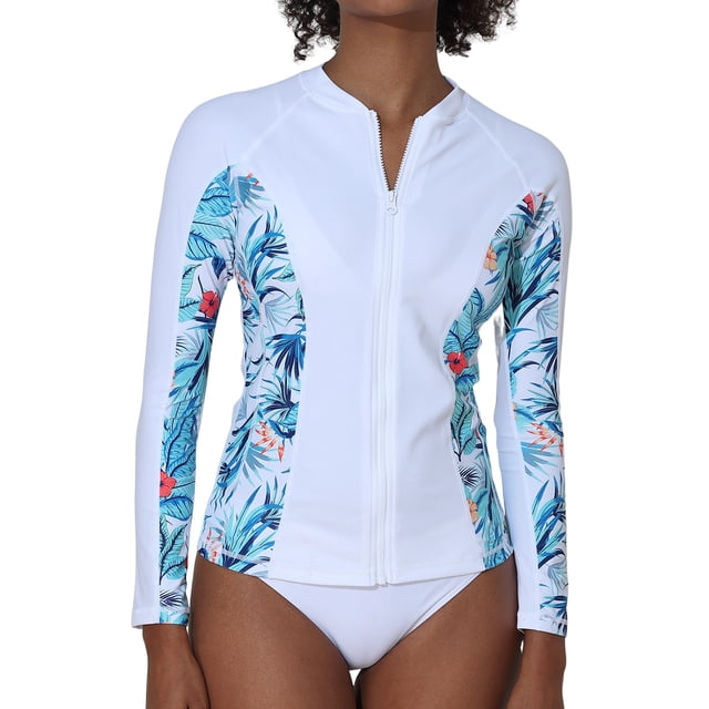 Charmo Womens Rash Guard Shirt Long Sleeve Raglan Sun Protection Swim Shirt in white with tropical floral side panels. Features a front zipper closure, banded crew neck, and flatlock seams for no-chafe comfort. Made from UPF 50+ fabric, this women's rashguard is perfect for swimming, surfing, snorkeling, and other sun-exposed activities.
