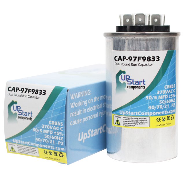30/5 MFD 370 Volts Double Round Run Capacitor Replacement for Goodman / Janitrol B94578700 - CAP-97F9833 by UpStart Components. l'Image Montre un Condensateur Cylindrique avec un Corps en Métal et des Spécifications Étiquetées, aux Côté de Son Emballage de Marque. Conçu pour les applications Électriques, Il Assure une performance Optimale et une Compatibilité avec les Systèmes Goodman et Janitrol.
