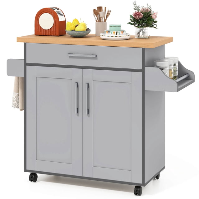 Costway Kitchen Island 44" Rolling Kitchen Cart with Drawer Adjustable Shelf Spice Rack Gray. This mobile kitchen cart features a natural wood countertop, a deep drawer, and two enclosed cabinets for storage. It includes side racks for spices and towels, and four wheels for mobility, with two lockable for stability. The gray engineered wood frame complements modern kitchen decor. The adjustable shelf inside the cabinet offers three height options for versatile storage. Suitable for use as a kitchen prep station, craft organizer, or living room storage unit.