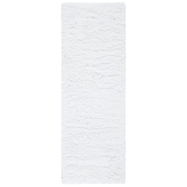 Safavieh Ocean Braxton Solid Shag Area Rug in white, a plush synthetic fiber runner rug with thick shag pile, shown in a full top-down view, ideal for adding softness and dimension to modern flooring and hallway spaces.