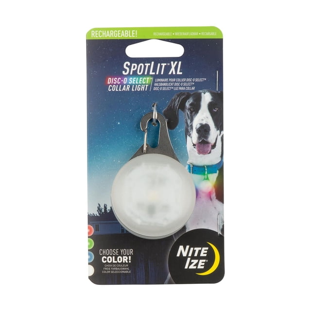 SpotLit™ XL Rechargeable Collar Light - Disc-O Select featuring a round, white translucent light with a stainless steel carabiner clip in retail packaging, designed for dog collars with selectable colors and rechargeable battery, shown with a dog wearing a blue collar light against a night sky background.