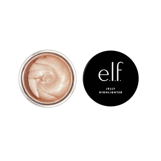 e.l.f. cosmetics Jelly Highlighter in a clear round jar showing smooth, shimmery champagne jelly texture, with a black lid featuring white e.l.f. logo and Jelly Highlighter text, ideal for illuminating skin alone or mixed with foundation for a glowing finish.