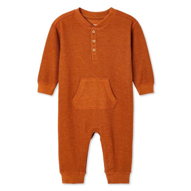 Rust-colored waffle knit henley romper for baby boys featuring long sleeves, three-button placket at the neck, and a kangaroo pocket on the front.