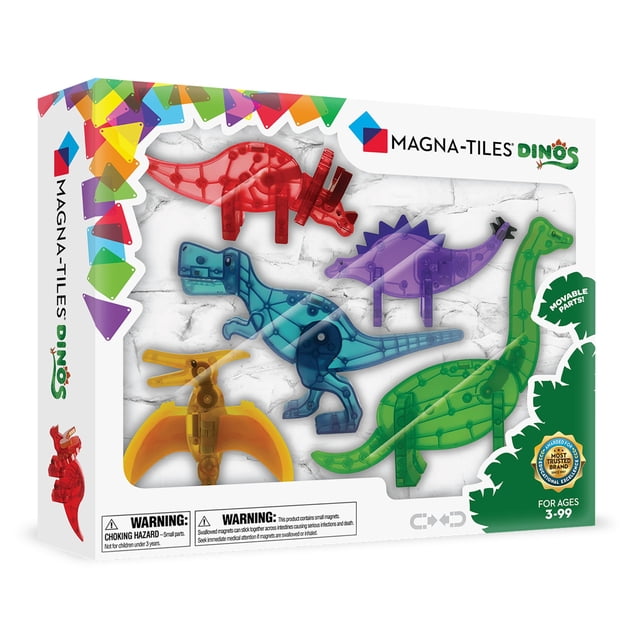 MAGNA-TILES Dinos 5-Piece Magnetic Construction Set, featuring colourful magnetic dinosaur figurines including a blue T-Rex, green Brachiosaurus, purple Stegosaurus, red Triceratops, and yellow Pteranodon. Each dinosaur has movable parts and ranges in size from 3 to 7.5 inches. The set is designed for children aged 3 and up, promoting STEAM learning and developmental skills. Packaged in a vibrant box with clear branding and safety warnings.