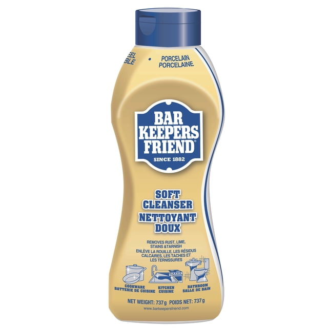Bar Keeper's Friend Soft Cleanser 26 oz bottle with blue cap and beige label, a multi-surface cleaner that removes rust, lime, stains, and tarnish from cookware, kitchen, and bathroom surfaces, suitable for hard, non-porous materials with bilingual English and French text.