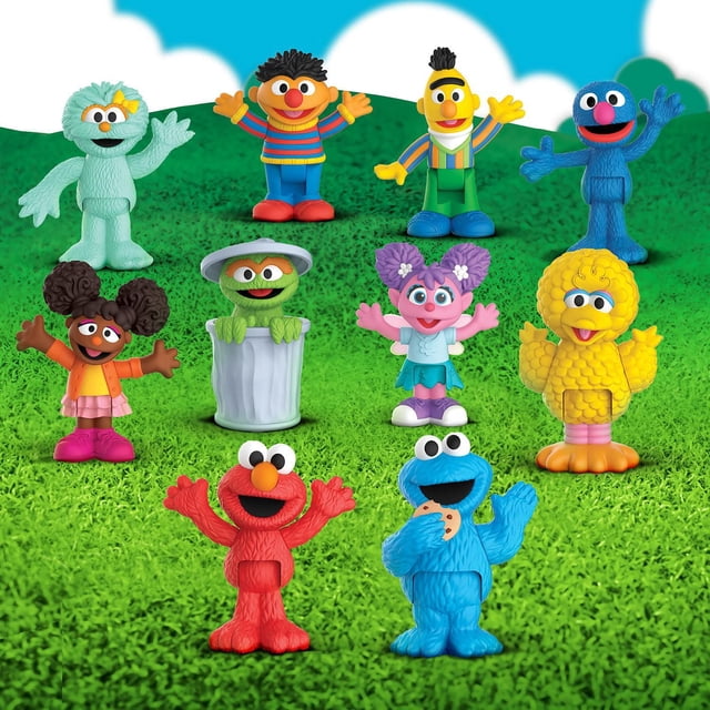 Sesame Street Neighborhood Friends, 10 Pieces Poseable Figurines on green grass with blue sky, featuring Elmo, Cookie Monster with cookie, Big Bird, Abby Cadabby, Oscar in trash can, Rosita, Bert, Ernie, and Grover. These 3-inch action figures have movable limbs for imaginative play and fine motor skill development.