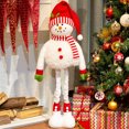 thumbnail image 2 of Christmas Snowman Figurine With Red Santa Hat Adorable Fabric Decoration For Holiday, 2 of 4