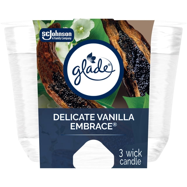 Glade® Bougie Parfumée à 3 Mèches Désodorisant d'Air, Délicate Étreinte de Vanille dans un Emballage Transparent avec des Gousses de Vanille, des Fleurs d'Orchidée Blanches et des Feuilles Vertes, Idéale pour la Décoration de Noël Intérieure et pour Ajouter une ambiance Chaleureuse des Fêtes.