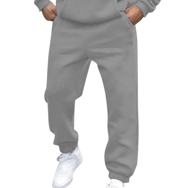 Pisexur Mens Sweatpants 2024 in solid grey color featuring an elastic waist with drawstring, straight leg design, and loose elastic bottom. These men's jogger pants include deep side pockets for secure storage, ideal for workouts, jogging, fitness, or casual lounging.