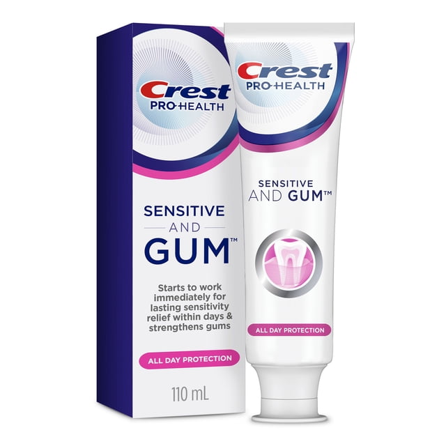 Crest Gum and Sensitivity, Sensitive Toothpaste All Day Protection 110 mL tube and box with Crest Pro-Health branding, showing claims of immediate sensitivity relief, gum strengthening, and all day protection with a pink and blue tooth graphic on white background.