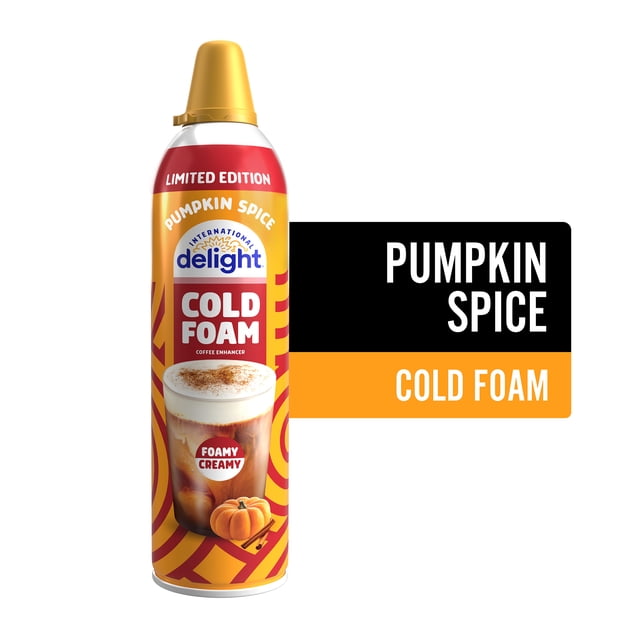 International Delight, Cold Foam, Pumpkin Spice, Limited Edition 369g centered can with label visible showing the International Delight logo and 'Pumpkin Spice' cold-foam text, close-up shows a foamy top served on a latte and an iced coffee; often used to finish lattes or top chilled coffee drinks.