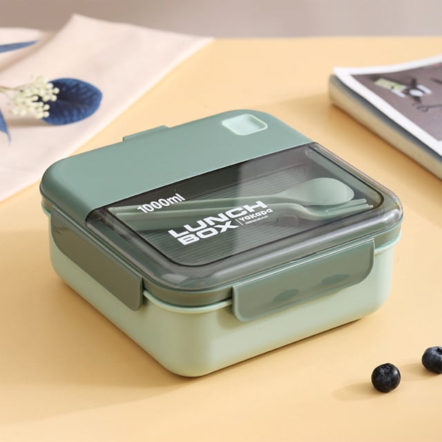 TopLLC Plastic Lunch Box Microwave Portable Student Adult Office Lunch Box Japanese Lunch Box Bento Box in a green color. The lunch box features a geometric windowpane design with a transparent lid displaying a spoon compartment. It has a four-sealing buckle design for strong sealing performance and measures 17x17x7.5cm. Suitable for office workers or students, it includes two separate compartments to keep food organized and maintain temperature. Made of safe, odorless plastic, it is easy to clean and durable.