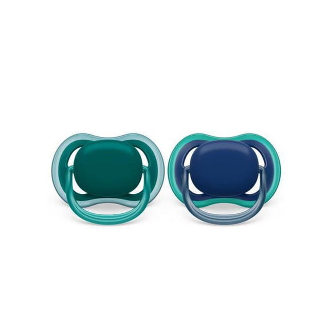 Philips Avent Ultra Air Pacifier 6-18m, deep opal and steel blue, 2 pack, front-facing view of two pacifiers with lightweight shields featuring four large ventilation holes each to keep baby's skin dry, soft silicone nipples with 98% acceptance, BPA-free, and compatible with microwave sterilizer cases.