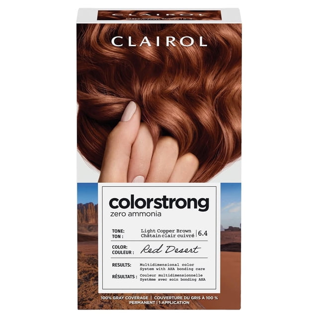 ColorStrong Permanent Hair Dye by Clairol in Light Copper Brown 6.4 Red Desert shade with zero ammonia and AHA bonding system for multidimensional color and hair structure reinforcement, shown with a close-up of wavy copper brown hair held by fingers.