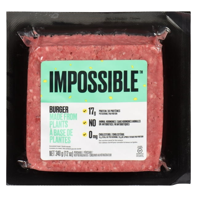 Impossible Ground Beef - Made from Plants 340g in black vacuum-sealed packaging with clear plastic, showing pink plant-based ground beef resembling raw meat, labeled with 17g protein per serving, no animal hormones or antibiotics, 0mg cholesterol, gluten-free, halal, and kosher, suitable for frozen plant-based protein recipes.