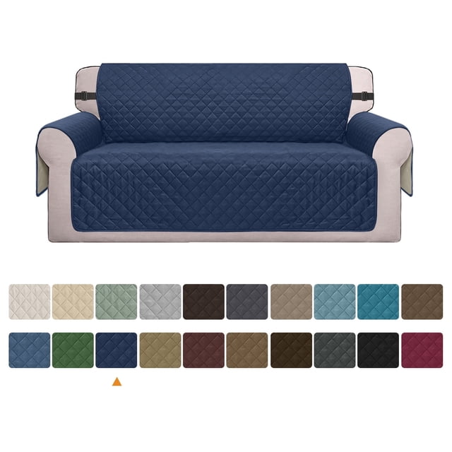 Reversible sofa cover in a quilted navy blue design, shown on a beige couch. The cover features elastic straps for a secure fit and is water-resistant, non-slip, and machine washable. It is suitable for protecting furniture from pets, children, and spills. Multiple color options are displayed below, including beige, green, and red.