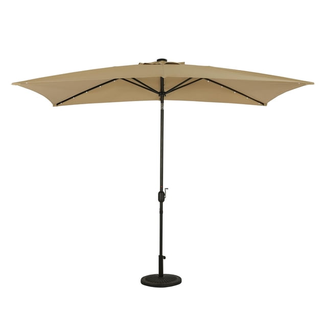 Nassau 6.5-ft x 10-ft rectangular market umbrella with champagne Breez-Tex canopy, solar-powered 32 LED bulb lights, rust-resistant bronze anodized aluminum pole with push-to-tilt feature, crank handle for easy opening, and single wind vent, shown fully open on a round base, suitable for patio shade and evening outdoor use.