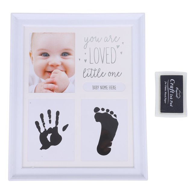 MOVTOTOP Newborn Handprint and Footprint Frame Cherished Baby Milestone Photo Display in a white ABS frame. The frame features sections for a baby photo, handprint, and footprint, along with the text 'You are loved little one' and a customizable nameplate. Includes a black craft ink pad for creating prints. Compact size of 27.5 x 23 x 2.5 cm, ideal for desktop decoration and preserving baby memories.