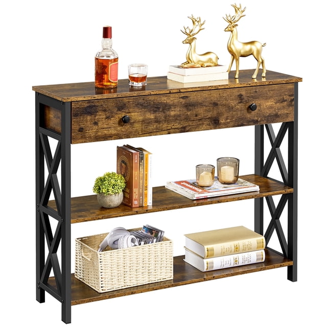 Yaheetech 2-Tier X-Design Console Table for Entryway Living Room in rustic brown finish. Features a rectangular tabletop, a large drawer with ball-bearing slides, and two open storage shelves. Made of MDF and iron with X-shaped side panels for reinforcement. Ideal for living rooms, hallways, or as a sofa table. Its industrial design complements various decor styles while providing ample storage space.