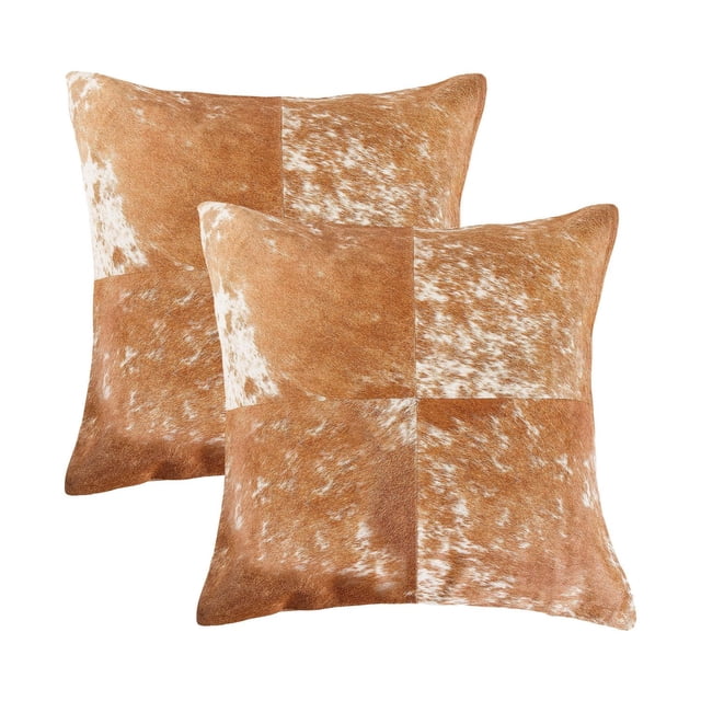 TORINO QUATTRO COWHIDE PILLOW 18"X18" 2-PACK with two hand-stitched square pillows made from 100% natural Indian cowhide in a brown and white patchwork pattern, featuring a hidden zipper and ultra-soft microsuede backing, suitable for layering in living spaces and adding natural texture to home décor.