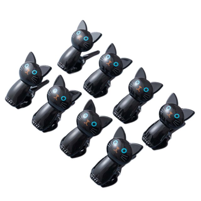 Food Clips for Bags 8pcs Kitchen Food Sealing Clips with black cat-shaped designs, featuring blue eyes and orange noses. These reusable plastic clips are compact and ideal for kitchen organization, sealing food packages, or securing office documents. Includes eight clips in varying sizes for versatile food storage solutions.