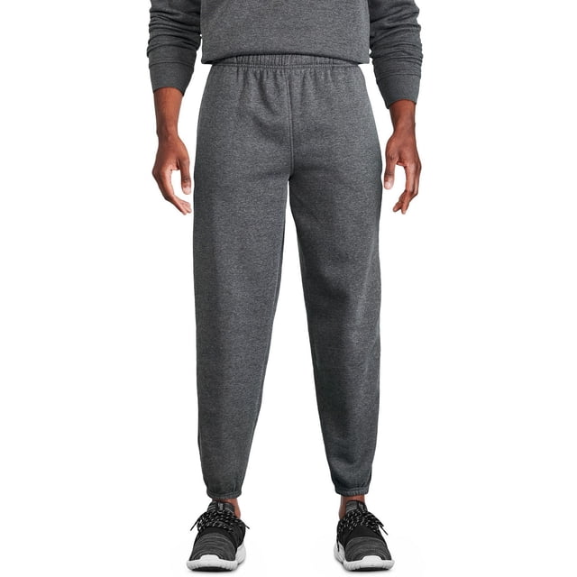Athletic Works Men's Fleece Pant in dark grey shown front-facing on a male model, crafted from soft fleece knit with elasticized waistband and cuffs, featuring two on-seam pockets, suitable for men's activewear and casual athletic bottoms.