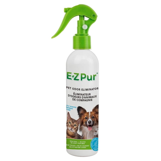 E-Z Pur Pet Odor Eliminator spray bottle with green trigger top, featuring a cat and dog on the label, designed for fast neutralization and odor control of pet smells in air, fabrics, and litter boxes, non-toxic and safe for cats and dogs.