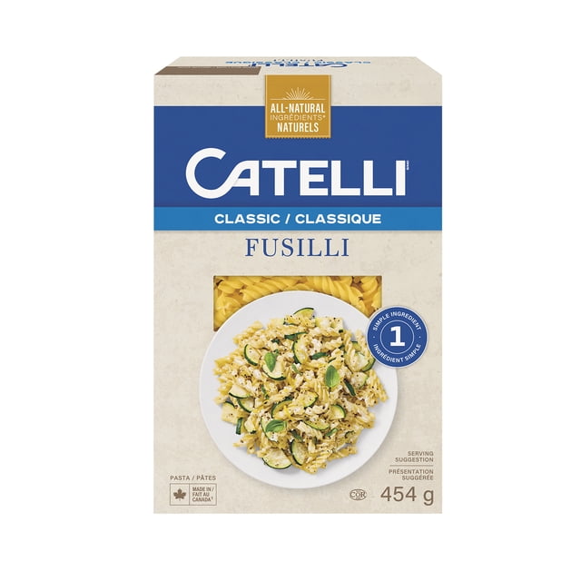 Catelli Fusilli dry pasta box with beige and blue packaging, featuring a window displaying yellow spiral fusilli pasta and a serving suggestion plate of fusilli with zucchini and herbs, weighing 454 g, made in Canada, suitable for chunky sauces and soups.