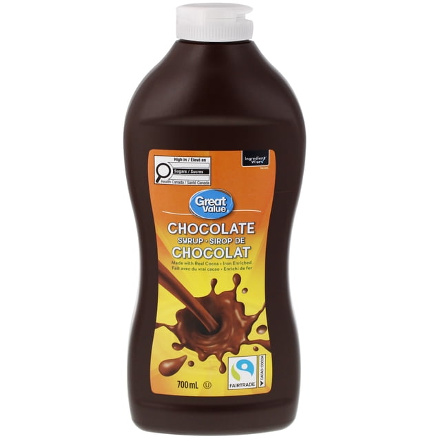 Great Value Chocolate Syrup 700 mL bottle with visible Great Value label, Fairtrade cocoa and Ingredient Wise marks; front-facing clear bottle shows dark brown syrup. Suggested uses: drizzle on ice cream or pancakes, stir into milk, or use as a dip suitable for pretzels or fresh fruit.