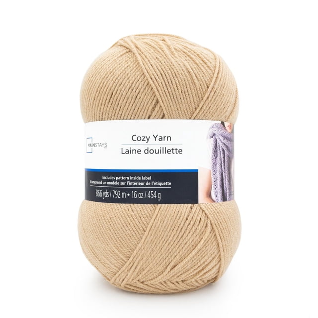 Mainstays Cozy Medium Acrylic Yarn 1 Ball in beige, 4-ply medium weight acrylic yarn weighing 454 g (16 oz) with 792 m (866 yds) length, featuring a label with a purple scarf pattern, suitable for crafting afghans, garments, and accessories, shown on white background.