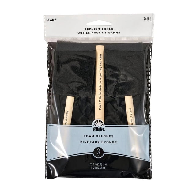 FolkArt 3 Piece Foam Brush Set with two 2-inch and one 3-inch black foam applicators on natural wood handles, ideal for smooth application of water-based paints and stains in arts and crafts, packaged in a clear resealable bag with a branded label.