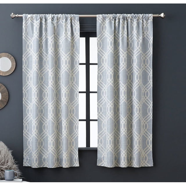 hometrends Zana Trellis Room Darkening Panel in light blue with an interlocking wavy geometric jacquard pattern, featuring a 3-inch rod pocket and thermal coated reverse for room darkening, noise reduction, and energy saving, hanging on a silver curtain rod against a dark grey wall with a window, machine washable and suitable for window coverings.
