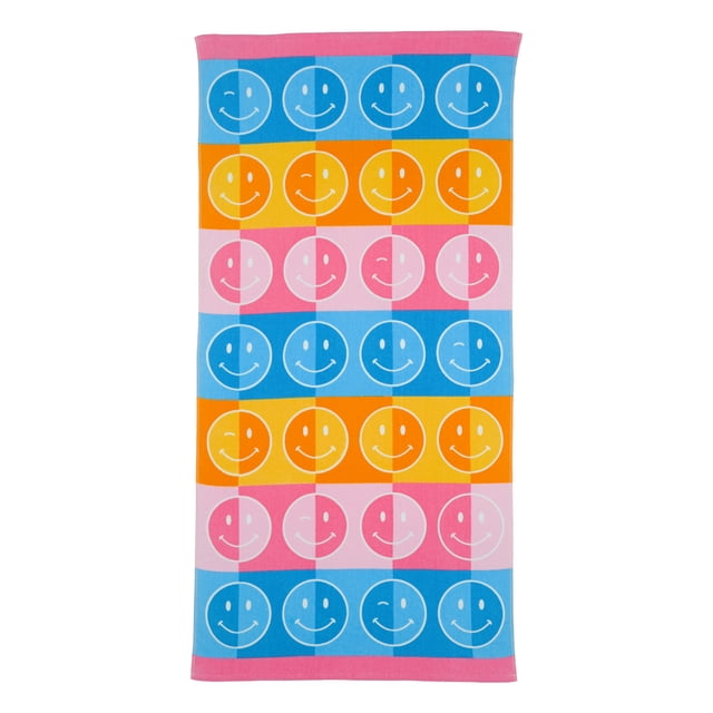 Mainstays Kids Beach Towel, Happy Check Smiley Faces, 60" x 30", soft cotton towel with colorful horizontal stripes in blue, orange, and pink featuring rows of white smiley face outlines, reinforced hems, and a hanging loop, ideal for beach, pool, or park use.
