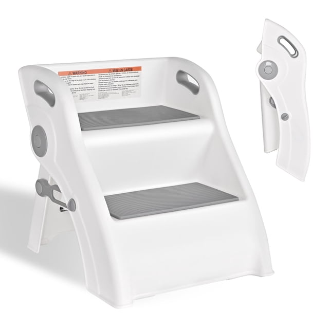 Folding Toddler Step Stool by LIVINGbasics, designed with a white and grey finish, two anti-slip steps, and a safety lock mechanism for stability. Made from durable PP material, it supports up to 30KG and folds flat for easy storage. Features a wide stepping platform and is ideal for potty training, bathroom sink access, and encouraging toddler independence.