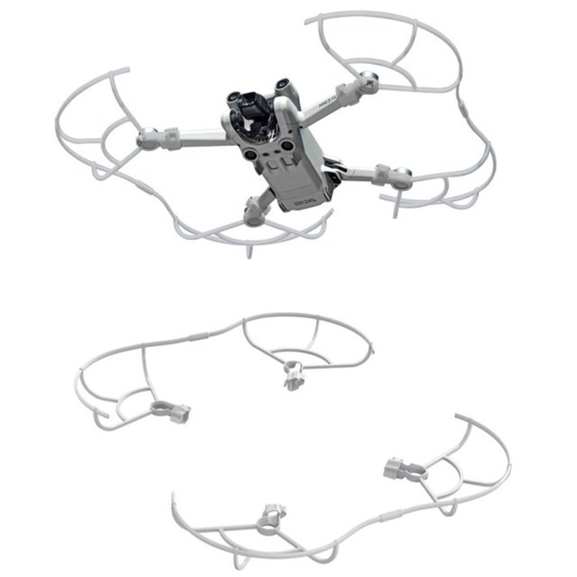 2 Pcs Propeller Guard Compatibles pour Drone Mini 3 Pro, Présentées dans un design en Plastique Léger. l'Image Affiche les Protecteurs d'Hélice Fixés à un Drone Mini 3 Pro, Offrant une protection anti-collision et Anti-Rayures. les Protecteurs Sont Blancs, Ultra-Légers, et Dotés d'Une Boucle de Démontage Rapide pour une installation Facile. une Vue Séparée des Deux Protecteurs Est Également Incluse, Mettant en Valeur Leur structure Incurvée et Leur Compatibilité avec les Hélices du Drone.