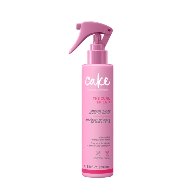 The Curl Friend Smooth Talkin' Blow Out Magic by Cake Beauty, a 200 ml pink spray bottle with trigger nozzle, provides 450°F heat protection to smooth and straighten curls for up to 72 hours, fights frizz and humidity, vegan and cruelty-free formula ideal for easy blow-drying and curl hydration.