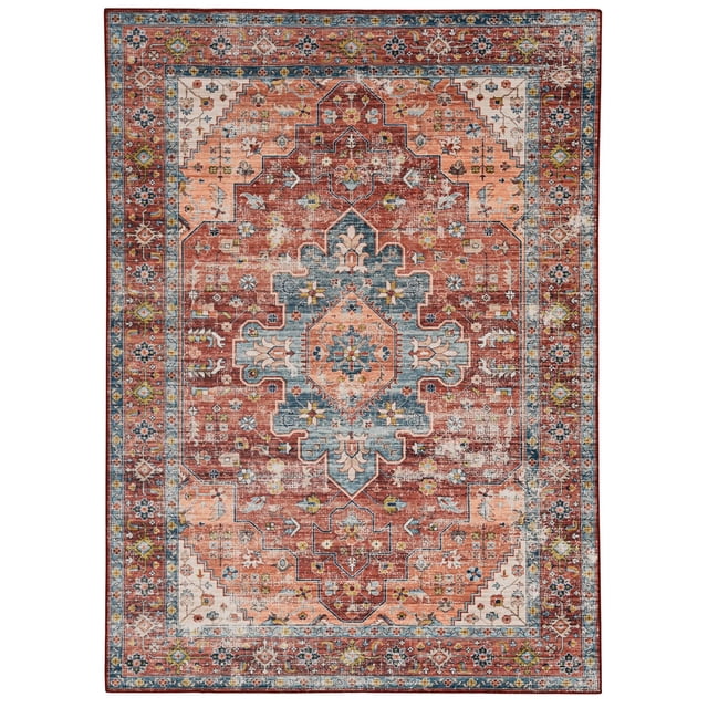 Carter 5' x 7' washable area rug in rust and ivory featuring an antique medallion design with distressed shades of blue, orange, and red. Made of stain-resistant polyester with nonslip backing, machine washable for easy care and ideal for high traffic areas or family rooms.