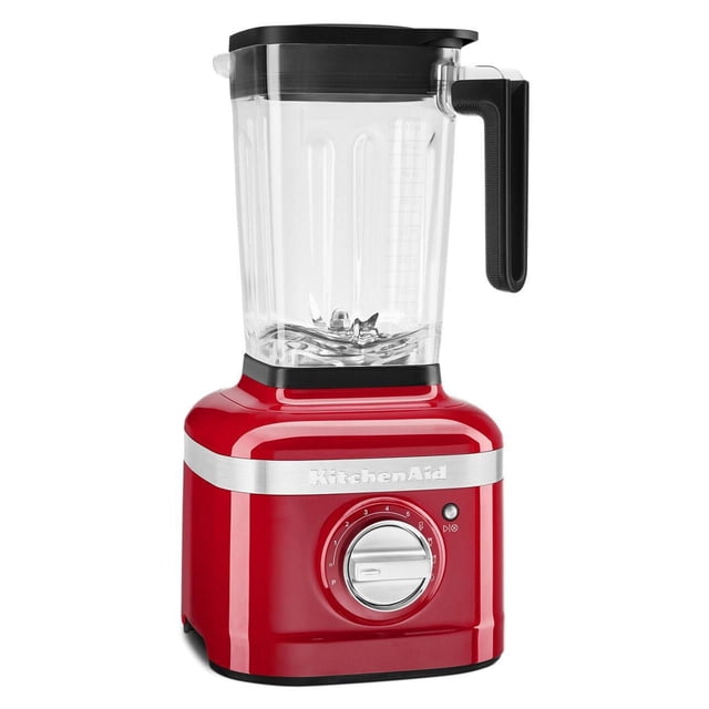 KitchenAid® K400 Blender in red with a clear ribbed 56 oz jar and black handle, featuring a silver variable speed dial with five settings and preset programs for ice crush and smoothies, designed as a countertop blender for versatile blending tasks.