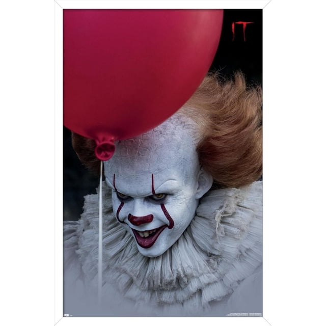 IT - Balloon Wall Poster, 14.725" x 22.375" showing a close-up of a white ruffled collar and orange hair behind a large red balloon, with the red 'IT' logo on a black background, printed on glossy poster paper suitable for wall art and party decoration.