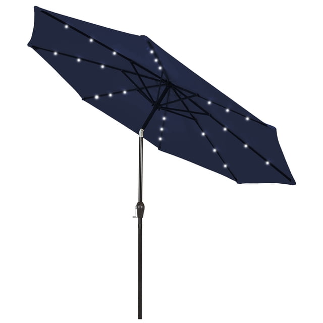 Costway Parasol Solaire de Patio de 9 Pi à DEL, Marché, en Acier, Inclinable avec Manivelle, Extérieur, Bleu Marine. Ce Parasol de Patio Bleu Marine Présente une Auvent de 9 Pieds de Diamètre en Tissu polyester durable, Soutenu par un Poteau en Acier de 1,5 Pouce de Diamètre et six Nervures Robustes. le Parasol Comprend 18 Lumières à DEL à Énergie Solaire, Réparties Uniformément le Long des Nervures, Offrant un Éclairage Écoénergétique pour une Utilisation Nocturne. Il Dispose d'Un Système de Levage à Manivelle pour une Ouverture et une Fermeture Faciles, et d'Un Mécanisme d'Inclinaison à Bouton