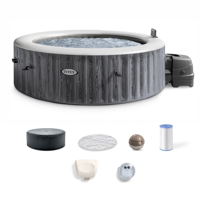 Intex PureSpa Greywood Deluxe Spa Set, 170 Bubble Jet Inflatable Hot Tub with Cover, 85x28 inches. Designed with a greywood exterior, round shape, and 6-person capacity. Features a hard water treatment system, easy-access cartridge filter pump, and thermal-resistant foam insulation to minimize heat loss. Includes accessories such as a cover, filter cartridge, and headrest for added convenience.