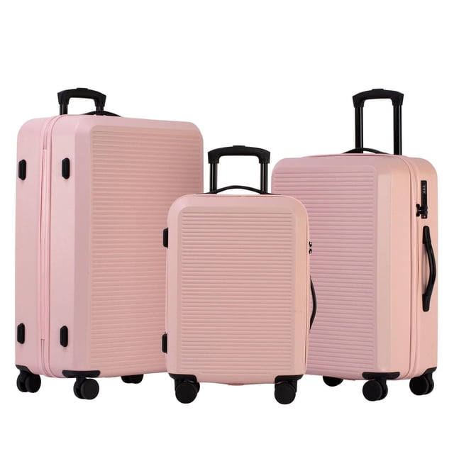 3-Piece Hardside Luggage Set in light pink includes 28 inch and 24 inch large suitcases plus a 20 inch carry-on, all with horizontal ridges, black locking telescopic handles, integrated TSA locks, and 360° spinner wheels for smooth maneuverability, suitable for organized travel.