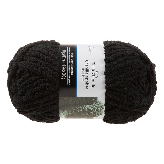 Mainstays Cozy Thick Chenille yarn in black, a plush skein with a lush, thick texture perfect for crafting warm blankets, pillows, or scarves, weighing 10.5 ounces and offering 97 yards of soft yarn suitable for knitting or crocheting projects.