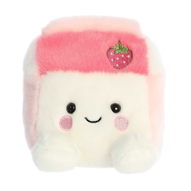 Aurora Palm Pals - Fresa Strawberry Milk Peluche de 5 Pouces Présentant une texture Douce et Duveteuse en Rose et Blanc. la Peluche a une Forme Carrée avec un Visage Souriant, des Joues Roses Brodées et un Petit Détail de Fraise sur le Dessus. Fabriquée avec des Matériaux de Haute Qualité et Remplie de Granules de Haricot pour la Stabilité, Elle Convient à Tous les Âges.