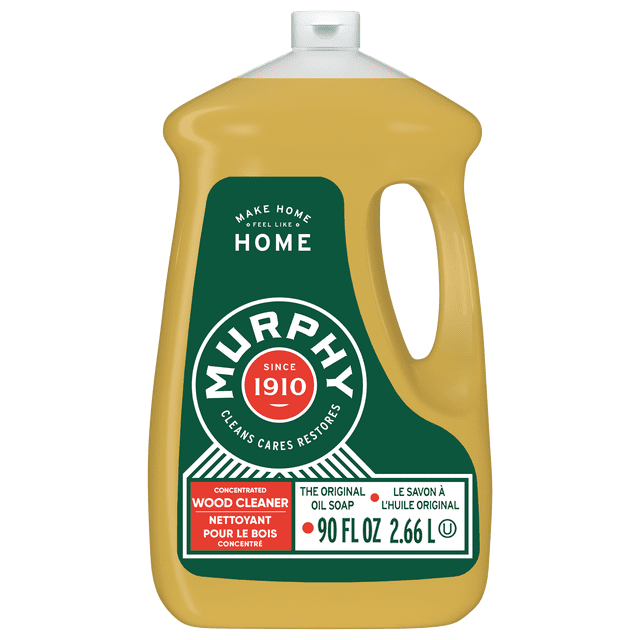 Murphy Oil Soap Concentrated Formula, Wood Cleaner, Citronella Oil Scent, 2.66 L Bottle front-facing concentrate bottle on neutral background; translucent amber liquid visible; labeled Murphy brand and product name; formulated for finished wood floors, cabinets and furniture and for non-wood surfaces such as ceramic tile and vinyl; intended to be diluted per directions and often used to pre-treat laundry stains.