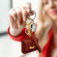 thumbnail image 5 of Stylish Leather Key Chain Pouch Handle Strap Coin Purse Bag Pendant Earphone Case Red Envelope, 5 of 5