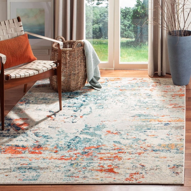 Safavieh Madison Brooke Tapis Vintage Abstrait pour Aire avec une construction en Fil à Poils Courts et durable avec un Motif Abstrait Multicolore en Bleu, orange et beige. Exposé sur Plancher de Bois Franc dans un Salon avec une Chaise à Sangle Tressée avec Coussin orange Brûlé, un Panier Tressé Tenant un Jeté Bleu Pâle, Près des Portes en Verre avec des Rideaux beige et un Grand Cache-Pot Gris. Convient pour Ajouter un style Transitionnel et de la Chaleur à la Déco Contemporaine de la Maison.