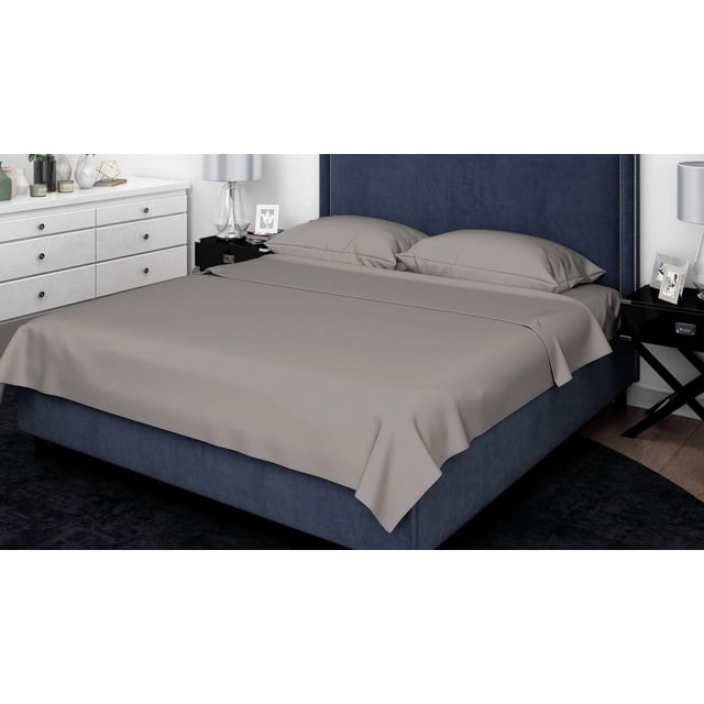 Johnson Home 500 Thread Count Certified Organic Cotton Sheet Sets in taupe on a navy blue upholstered bed with nailhead trim headboard, featuring a smooth flat sheet and two pillowcases in a modern bedroom with white dresser, black nightstands, and silver lamps, suitable for year-round breathable comfort.
